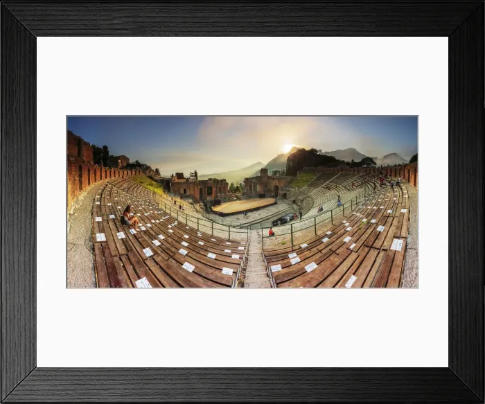 Framed Print : Taormina, Sicily. People sitting in the greek theater with the sun setting