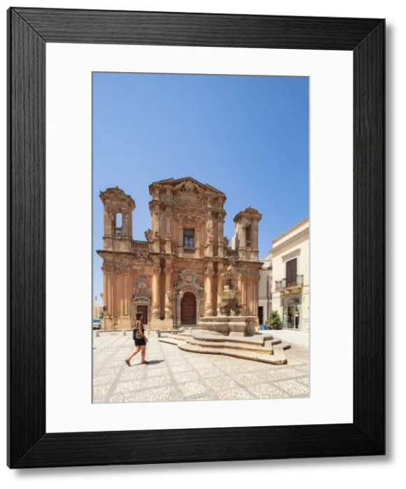 Framed Print : Trapani, Sicily. A woman walking in front of Purgatory Church in Marsala town center Framed Print : Trapani, Sicily. A woman walking in front of Purgatory Church in Marsala town center