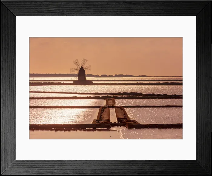 Framed Print : Marsala, Sicily. Windmills reflecting at sunset in the saltern between Marsala Framed Print : Marsala, Sicily. Windmills reflecting at sunset in the saltern between Marsala