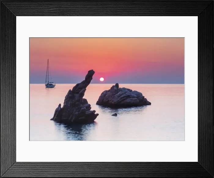 Framed Print : Cefalu, Sicily. Sun rising beyond the rock formations at Kalura beach near Cefalu Framed Print : Cefalu, Sicily. Sun rising beyond the rock formations at Kalura beach near Cefalu