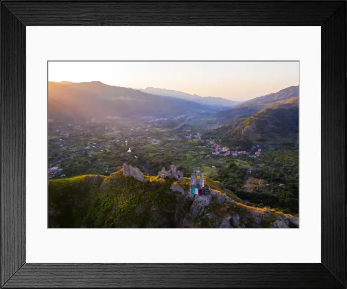 Framed Print : Gole dellaaAlcantara, Sicily. Aerial view of Ruffo castle ruins at sunrise with Framed Print : Gole dellaaAlcantara, Sicily. Aerial view of Ruffo castle ruins at sunrise with