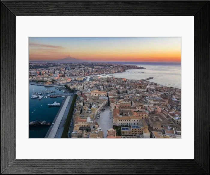 Framed Print : Siracusa, Sicily. Aerial view of Ortigia island at sunrise with Etna mountain in Framed Print : Siracusa, Sicily. Aerial view of Ortigia island at sunrise with Etna mountain in
