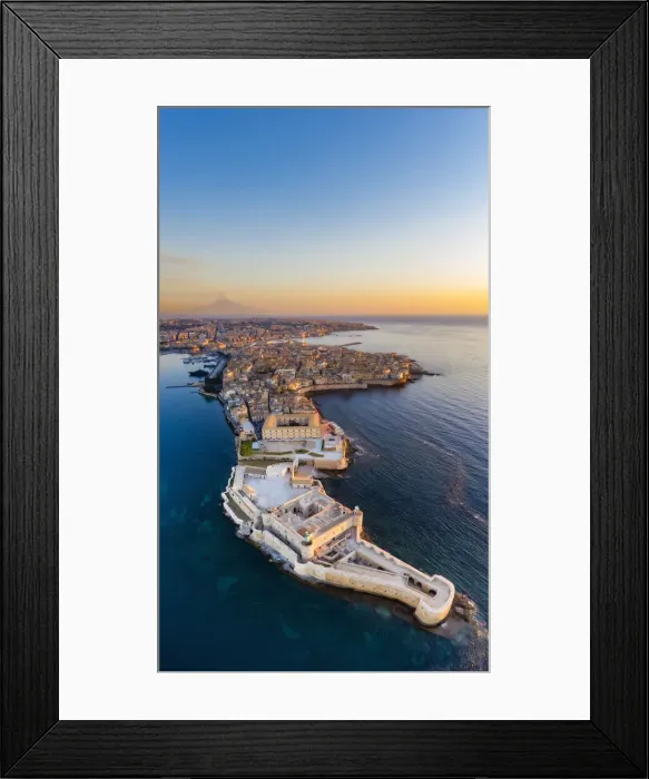 Framed Print : Siracusa, Sicily. Aerial view of Ortigia island at sunrise with Etna mountain in Framed Print : Siracusa, Sicily. Aerial view of Ortigia island at sunrise with Etna mountain in