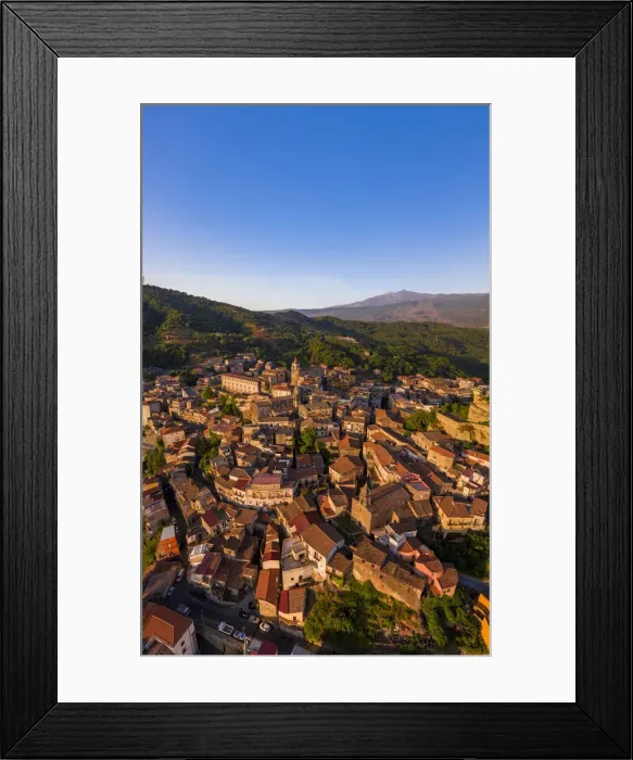 Framed Print : Castiglione di Sicilia, Sicily. Aerial view of the village with the Etna volcano in Framed Print : Castiglione di Sicilia, Sicily. Aerial view of the village with the Etna volcano in
