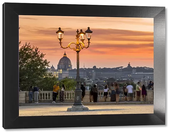 View over St. Peters Basilica at sunset from Pincio terrace, Rome, Lazio, Italy
