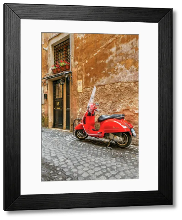 Framed Print : Parked red Vespa scooter in a cobbled street of Rome, Lazio, Italy Framed Print : Parked red Vespa scooter in a cobbled street of Rome, Lazio, Italy