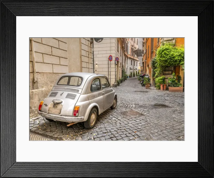 Framed Print : Old classic Fiat 500 car parked in a cobbled street of Rome, Lazio, Italy