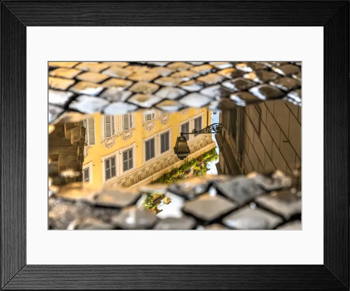 Framed Print : Picturesque corner of the old town reflected in a puddle on a cobbled street, Rome, Lazio Framed Print : Picturesque corner of the old town reflected in a puddle on a cobbled street, Rome, Lazio
