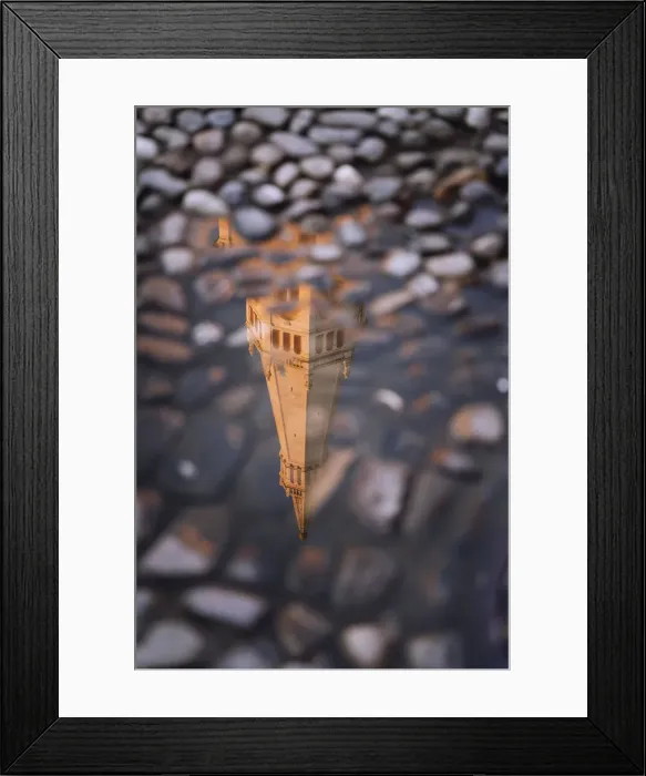 Framed Print : Ghirlandina tower reflecting on water in Piazza Grande, Modena, Emilia Romagna, Italy