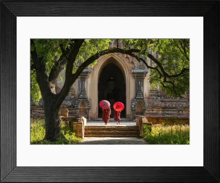 Framed Print : Two novice Buddhist monks with red umbrellas walking to temple, Bagan, Mandalay Region Framed Print : Two novice Buddhist monks with red umbrellas walking to temple, Bagan, Mandalay Region