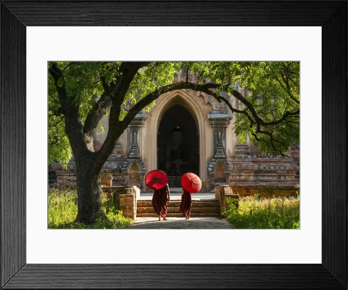 Framed Print : Two novice Buddhist monks with red umbrellas walking to temple, Bagan, Mandalay Region Framed Print : Two novice Buddhist monks with red umbrellas walking to temple, Bagan, Mandalay Region