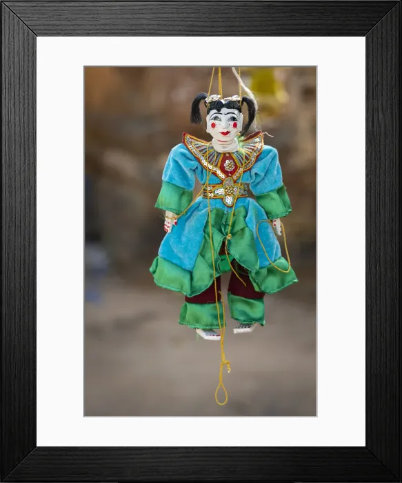 Framed Print : Close-up of Burmese puppet (AKA Yoke the or marionettes) hanging from strings, Mandalay Framed Print : Close-up of Burmese puppet (AKA Yoke the or marionettes) hanging from strings, Mandalay