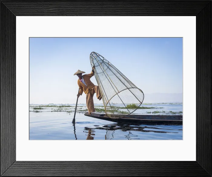 Framed Print : Intha fisherman with a traditional conical fishing net against clear sky, Lake Inle Framed Print : Intha fisherman with a traditional conical fishing net against clear sky, Lake Inle
