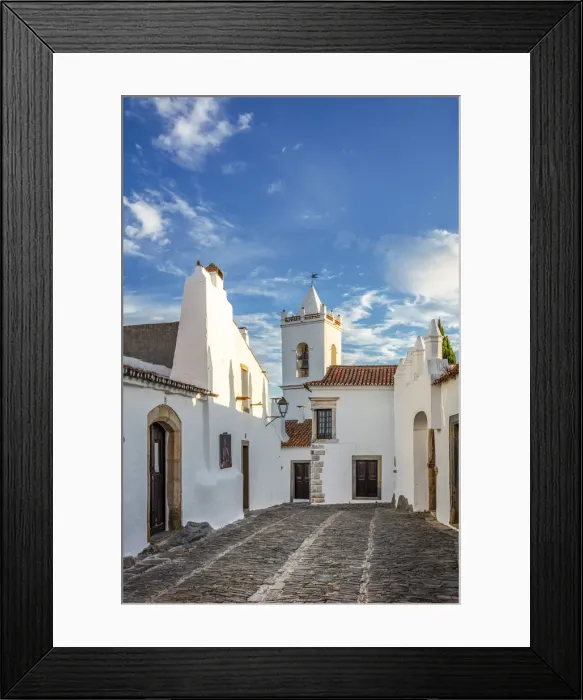 Framed Print : Portugal, Alentejo, Monsaraz. Cobbled streets leading to the bell tower gateway of Framed Print : Portugal, Alentejo, Monsaraz. Cobbled streets leading to the bell tower gateway of