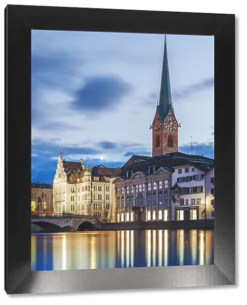 Europe, Switzerland, Zurich, night time view of the clocktower of Fraumunster cathedral
