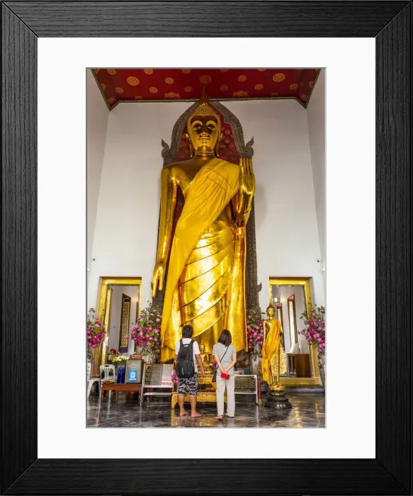 Framed Print : People looking at a Buddha statue in Wat Pho (Temple of the Reclining Buddha), Bangkok
