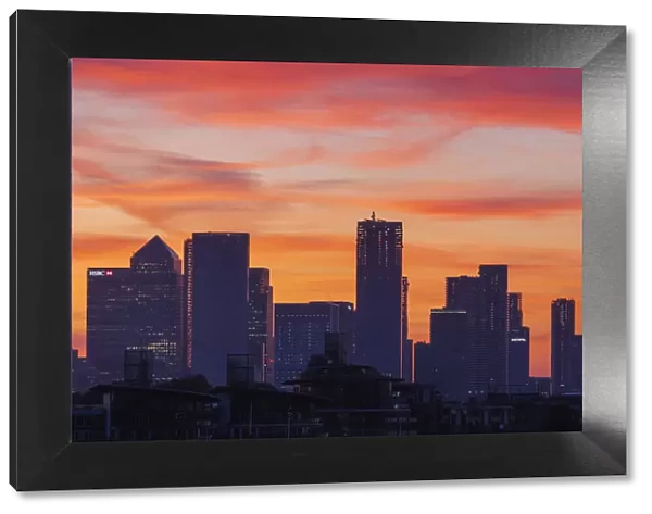 England, London, Docklands, Silouette of Canary Wharf Skyline at Dawn