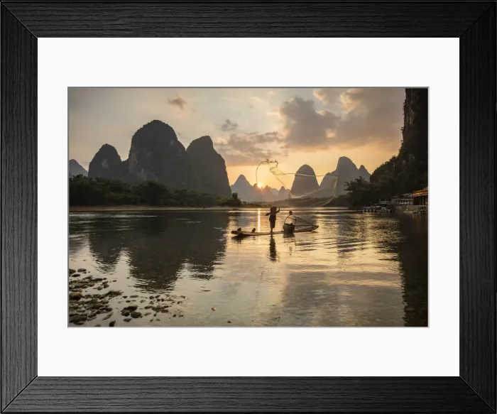 Framed Print : Cormorant fisherman throwing net on Li River at dawn, Xingping, Yangshuo, Guangxi, China Framed Print : Cormorant fisherman throwing net on Li River at dawn, Xingping, Yangshuo, Guangxi, China