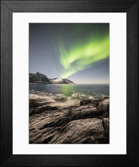 Framed Print : Frozen sea and rocky peaks illuminated by Northern Lights, Tungeneset, Senja, Tromso