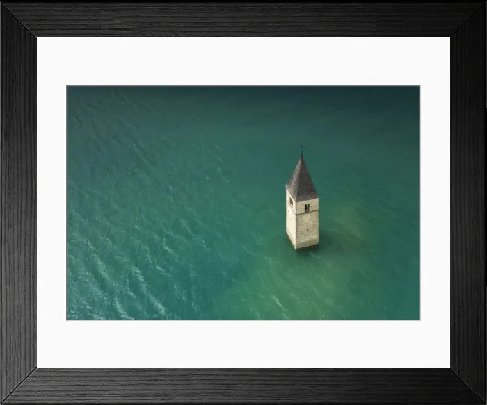 Framed Print : The bell-tower of Graun in Vinschgau, Reschensee - Lago di Resia, Bolzano, South Tyrol Framed Print : The bell-tower of Graun in Vinschgau, Reschensee - Lago di Resia, Bolzano, South Tyrol