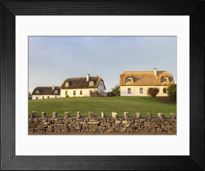 Framed Print : Houses near the Dunguaire Castle. County Galway, Connacht province, Ireland Framed Print : Houses near the Dunguaire Castle. County Galway, Connacht province, Ireland