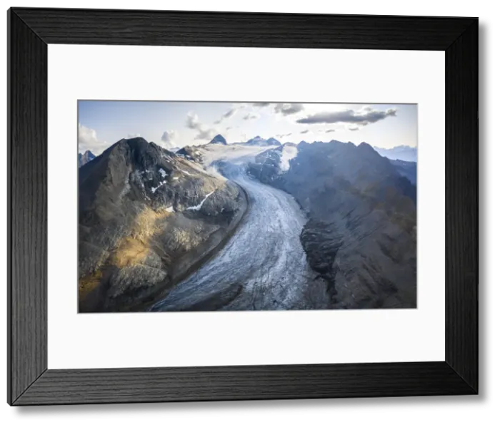 Framed Print : Aerial view of the Gries Glacier winding down from the Blinnenhorn mountain at sunset Framed Print : Aerial view of the Gries Glacier winding down from the Blinnenhorn mountain at sunset