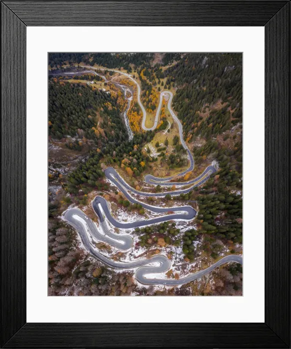 Framed Print : Aerial view of curves of Maloja Pass road in autumn, Bregaglia Valley, Graubunden, Engadine, Switzerland