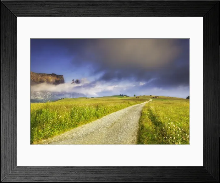 Framed Print : Sunrise on the Alpe di Siusi. In the background the peaks of Sciliar