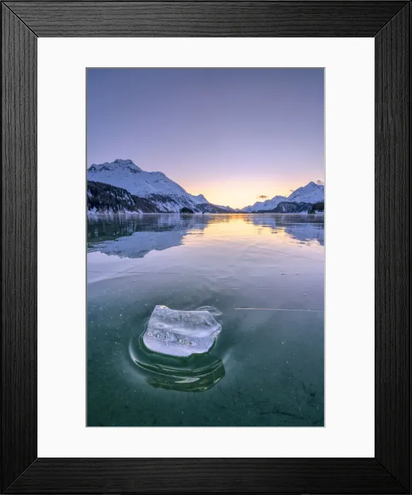Framed Print : Ice block on frozen water of Lake Sils lit by a cold winter sunset, Graubunden, Engadine