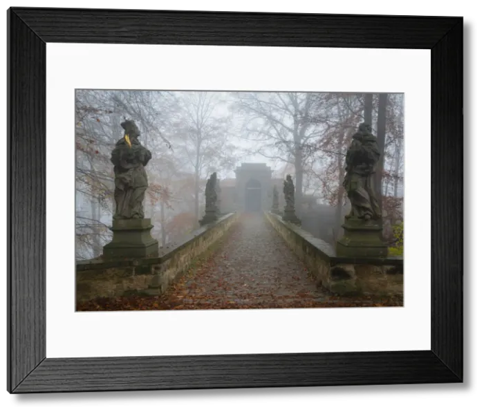 Framed Print : Bridge with statues leading to Valdstejn castle on a misty day, Hruba Skala Framed Print : Bridge with statues leading to Valdstejn castle on a misty day, Hruba Skala