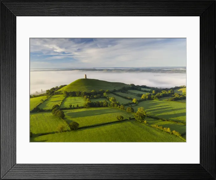 Framed Print : Aerial vista of St Michaels Tower on Glastonbury Tor, Somerset, England Framed Print : Aerial vista of St Michaels Tower on Glastonbury Tor, Somerset, England