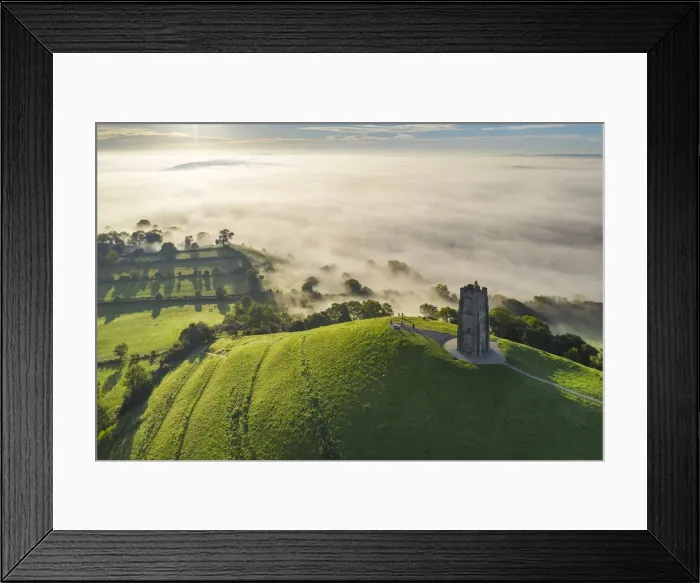 Framed Print : Aerial vista of St Michaels Tower on Glastonbury Tor, Somerset, England Framed Print : Aerial vista of St Michaels Tower on Glastonbury Tor, Somerset, England