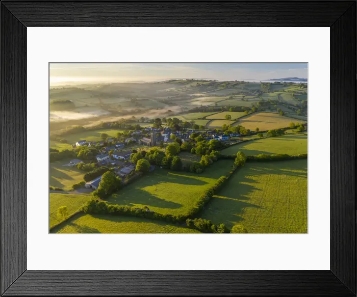 Framed Print : Aerial vista of the Dartmoor village of South Tawton at dawn, Devon, England