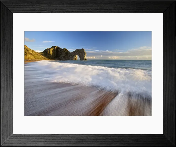 Framed Print : Durdle Door with surf on beach, Jurassic Coast, Dorset, England Framed Print : Durdle Door with surf on beach, Jurassic Coast, Dorset, England