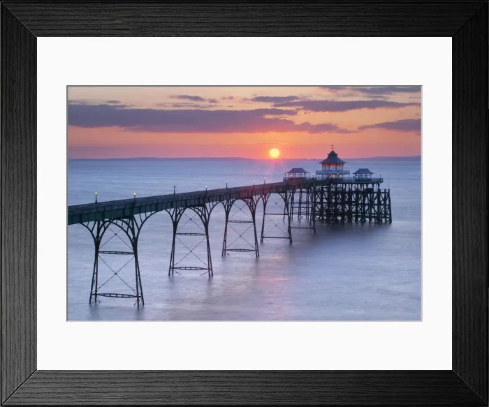 Framed Print : Clevedon Pier at sunset, Severn Estuary looking towards Wales Framed Print : Clevedon Pier at sunset, Severn Estuary looking towards Wales
