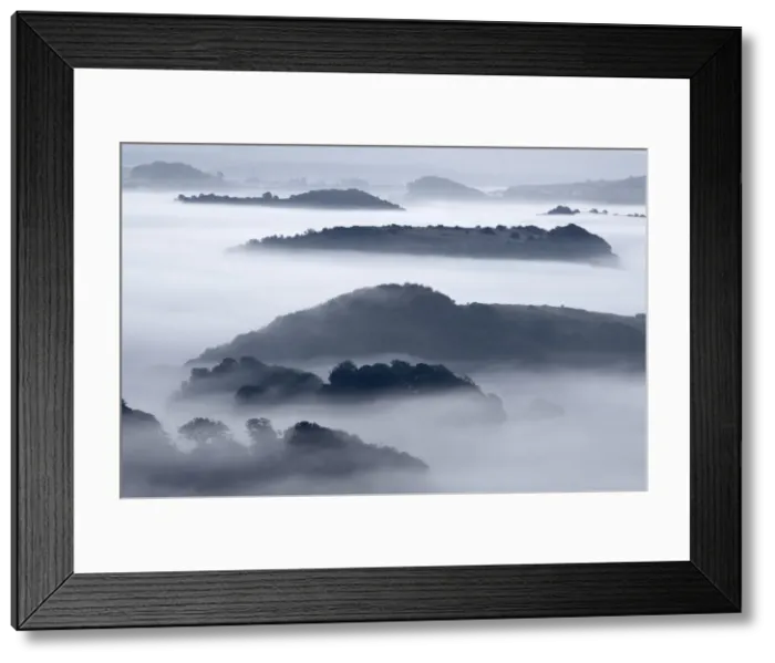 Framed Print : Mist shrouded hills in the Marshwood Vale, Bridport, Dorset, England Framed Print : Mist shrouded hills in the Marshwood Vale, Bridport, Dorset, England