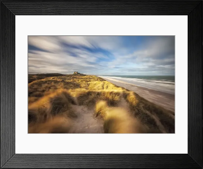 Framed Print : Sand dunes and Bamburgh Castle, Northumberland, England, UK Framed Print : Sand dunes and Bamburgh Castle, Northumberland, England, UK