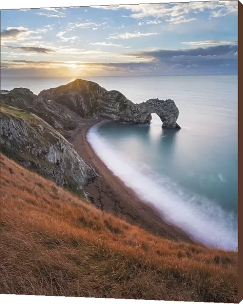 Durdle Door at sunrise, Jurassic Coast, Dorset, England