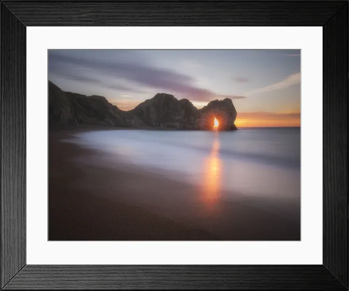 Framed Print : Sunrise through Durdle Door, Jurassic Coast, Dorset, England, UK Framed Print : Sunrise through Durdle Door, Jurassic Coast, Dorset, England, UK