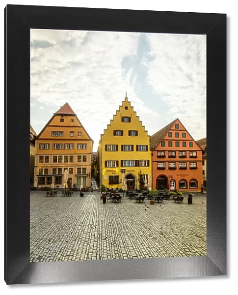 Cafes and colourful buildings at the market square, Rothenburg ob der Tauber, Germany