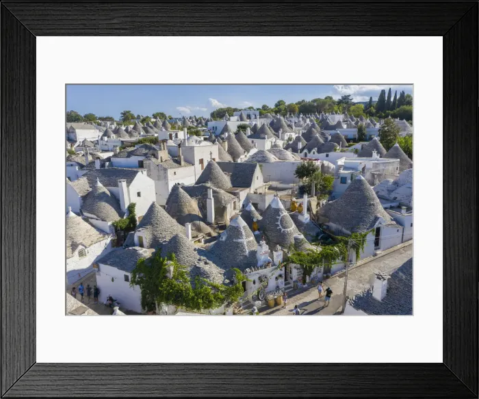 Framed Print : Italy. Apulia (Puglia). Itria Valley, Alberobello with traditional Trulli Houses Framed Print : Italy. Apulia (Puglia). Itria Valley, Alberobello with traditional Trulli Houses