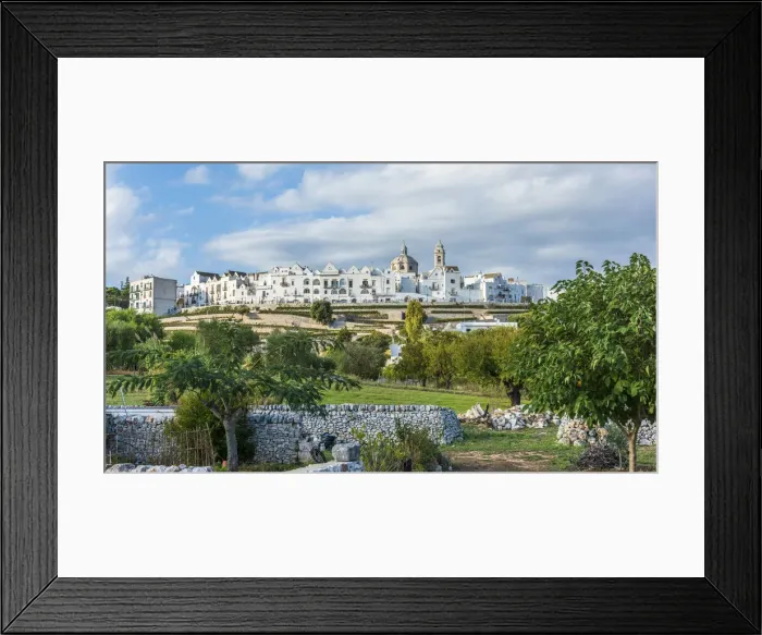 Framed Print : europe, Italy, Apulia. Locorotondo - a view towards the typical skyline of the white town Framed Print : europe, Italy, Apulia. Locorotondo - a view towards the typical skyline of the white town