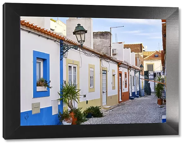 Street of the traditional fishing village of Alcochete, spreading along the river Tagus
