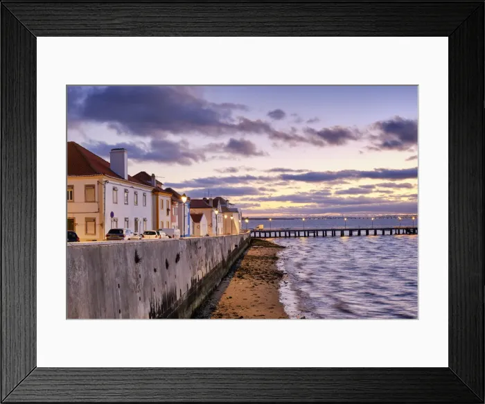 Framed Print : The traditional fishing village of Alcochete, spreading along the river Tagus