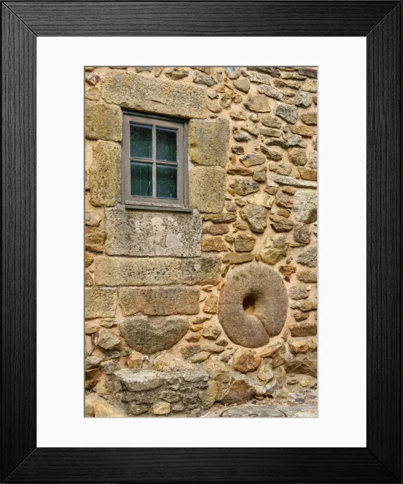 Framed Print : A millstone on the wall of a traditional house. Castelo Rodrigo, Beira Alta. Portugal Framed Print : A millstone on the wall of a traditional house. Castelo Rodrigo, Beira Alta. Portugal