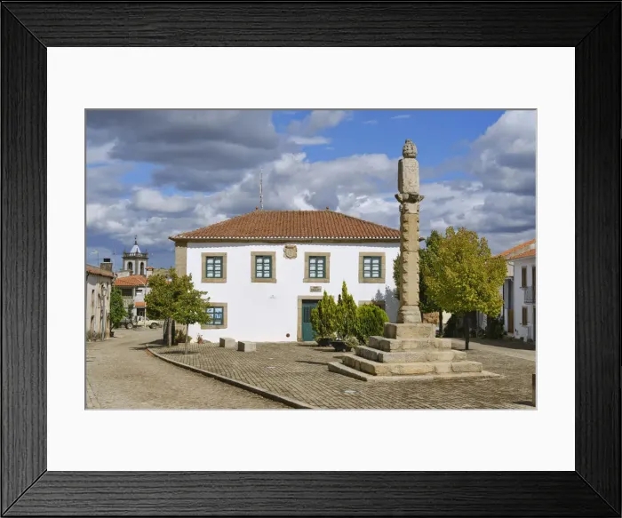 Framed Print : The stone pilori, symbol of municipal authority, that stands in the main square of Algoso Framed Print : The stone pilori, symbol of municipal authority, that stands in the main square of Algoso