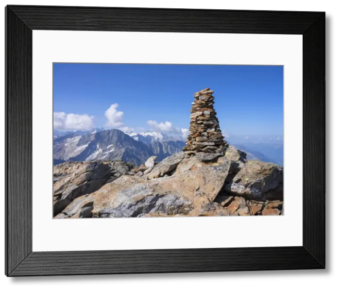 Framed Print : Summit cairn on Ofenhoren mountain with view at Bernese Alps, Urner Alps, canton Berne Framed Print : Summit cairn on Ofenhoren mountain with view at Bernese Alps, Urner Alps, canton Berne