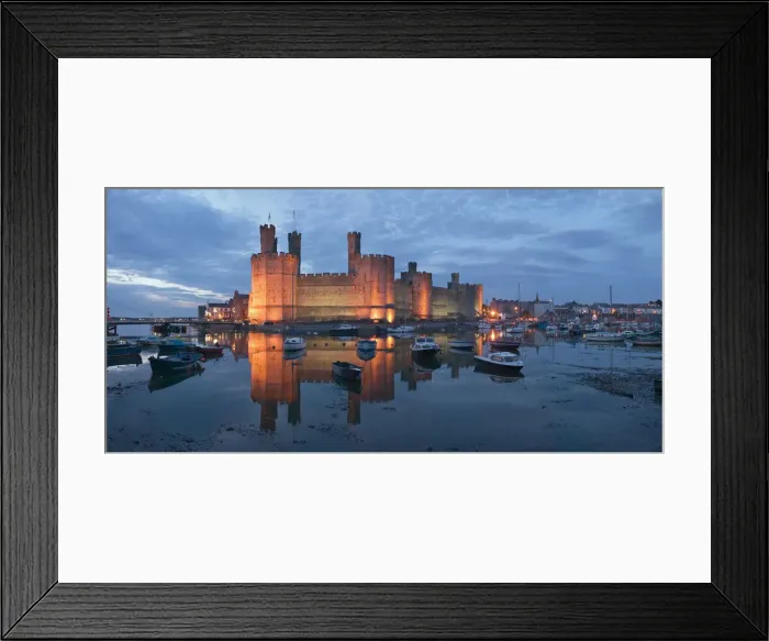 Framed Print : Caernarfon Castle at dusk Gwynedd, Wales Framed Print : Caernarfon Castle at dusk Gwynedd, Wales