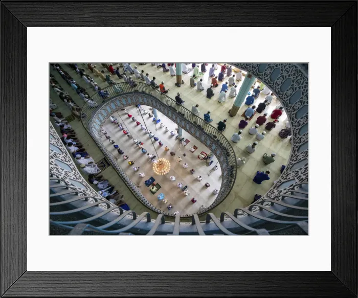 Framed Print : Thousands of people come together to pray over several floors of one of the biggest Framed Print : Thousands of people come together to pray over several floors of one of the biggest