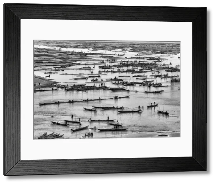 Framed Print : People on the hundreds boats are busy collecting various types of stone from the Jadukata Framed Print : People on the hundreds boats are busy collecting various types of stone from the Jadukata